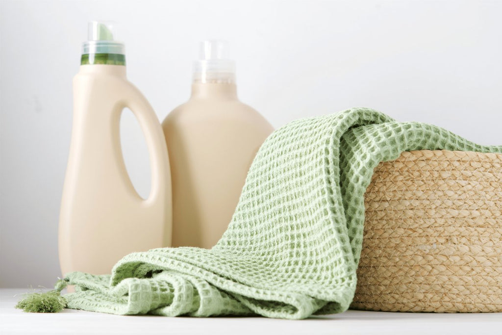 Natural and eco-friendly organic cleaning supplies, including biodegradable sponges and non-toxic cleaning sprays